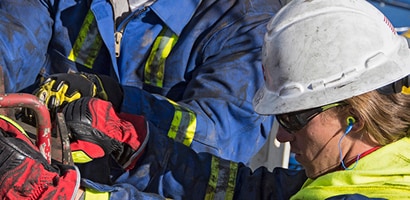 Oil rig workers wearing PPE
