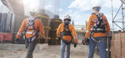 A group of people wearing safety gear
